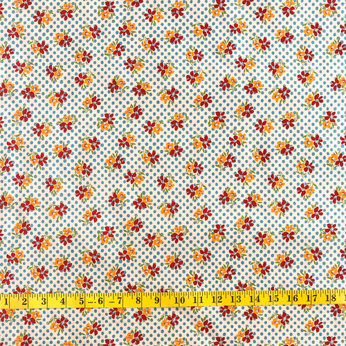 Small orange flower - blue spot